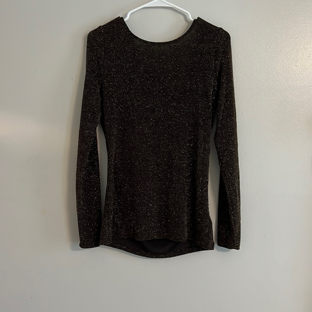 So cute!  Black and gold Michael Kors shirt with lower back drop and gold chain.